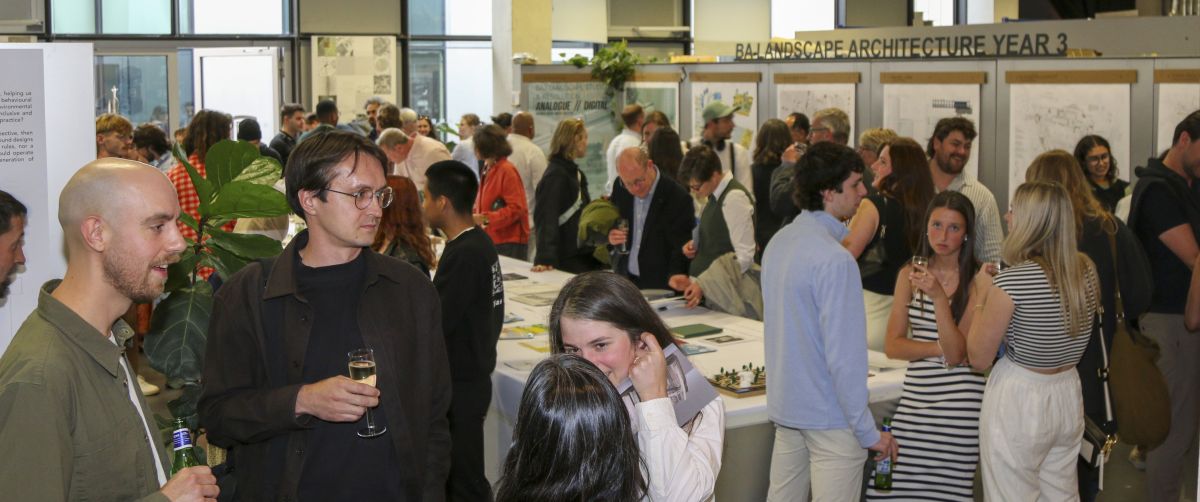 Photograph of end of year exhibition, showing the opening night celebrations.