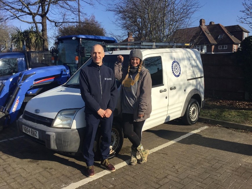 Simon Earp and Amey James in front of the donated UoG van