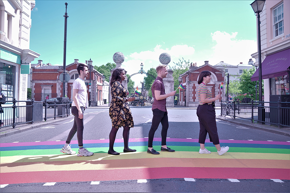 4 students crossing the street 