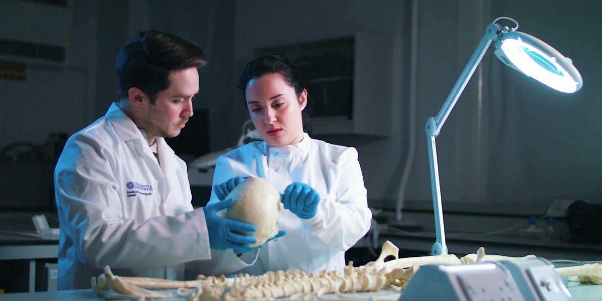 Get hands-on with mock practical crime scenes. Student using lab equipment