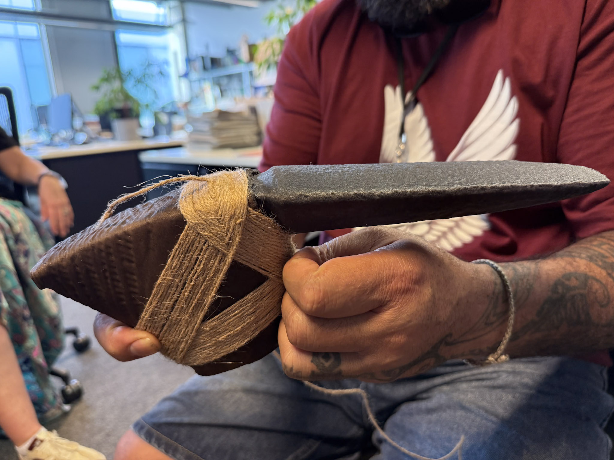 Atatoa wraps coconut-fibre lashing around a blade