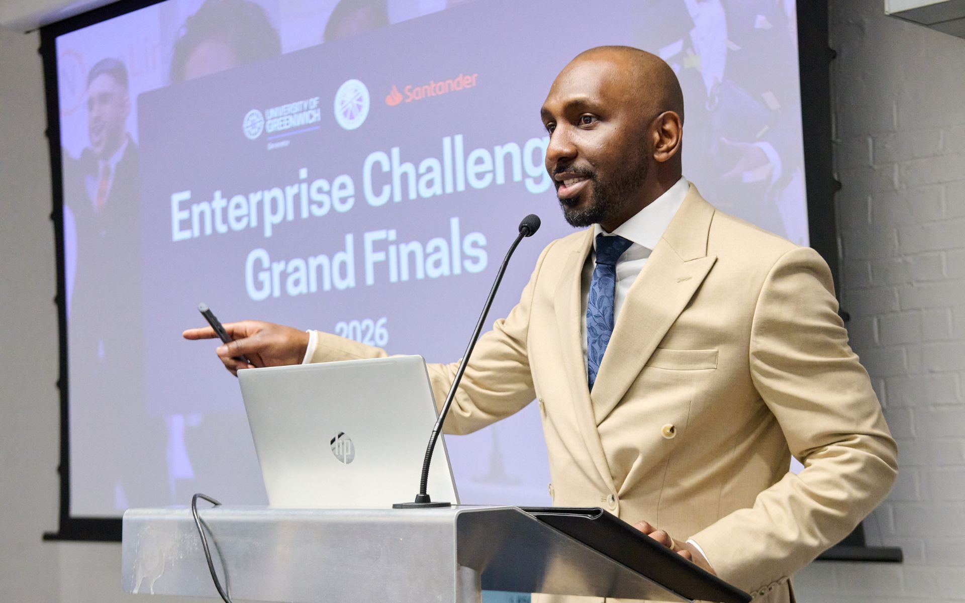 man presenting on stage