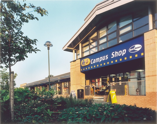 Kent Union Campus Shop Exterior of the Kent Union campus shop with landscaping and campus buildings nearby.