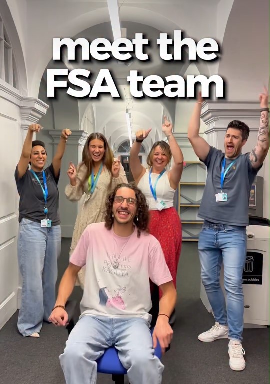 A group of five people with their arms raised in celebration in a hallway, with the text "meet the FSA team" overlaid at the top.