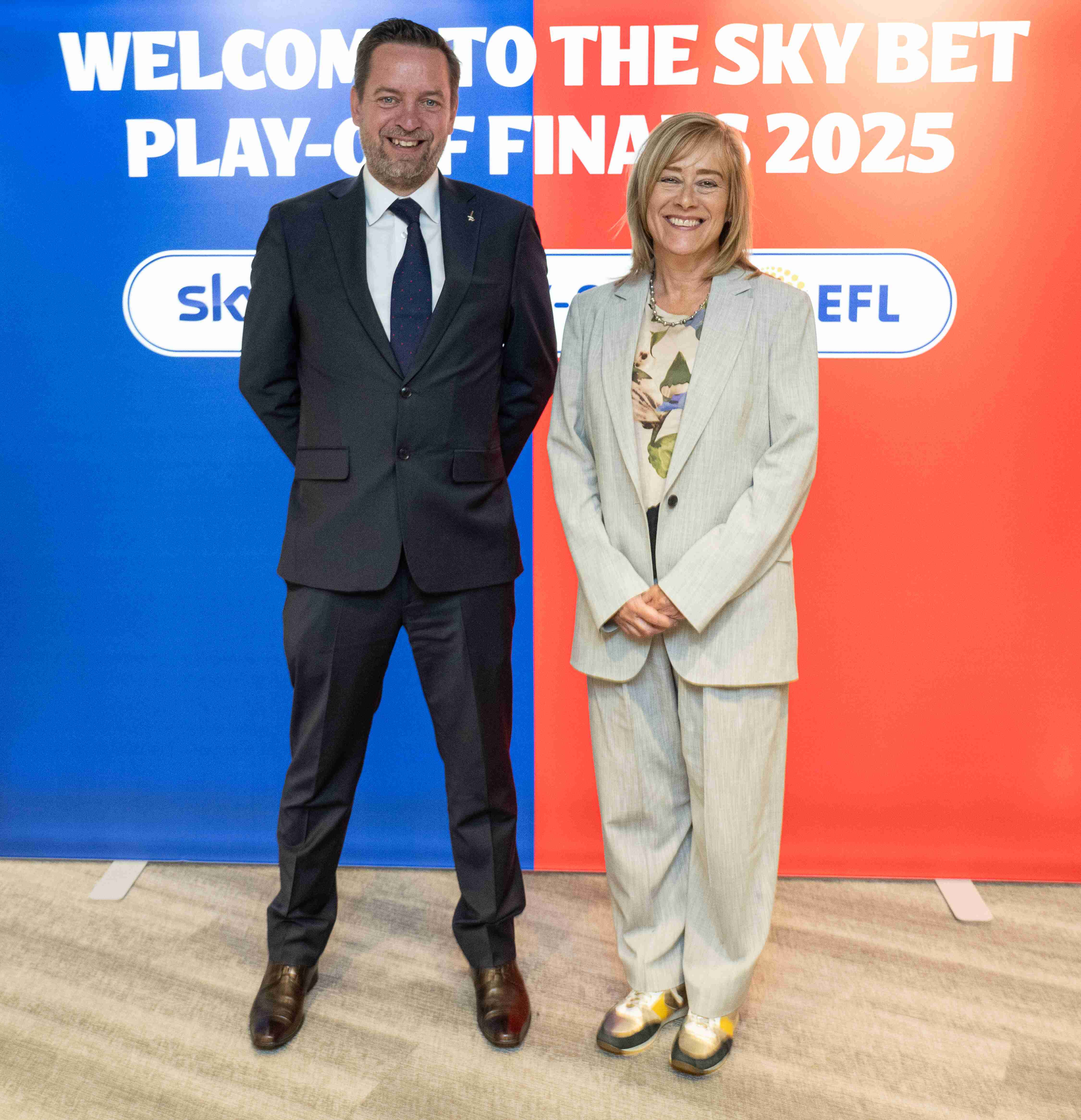 Jane & Gavin Carter standing together 