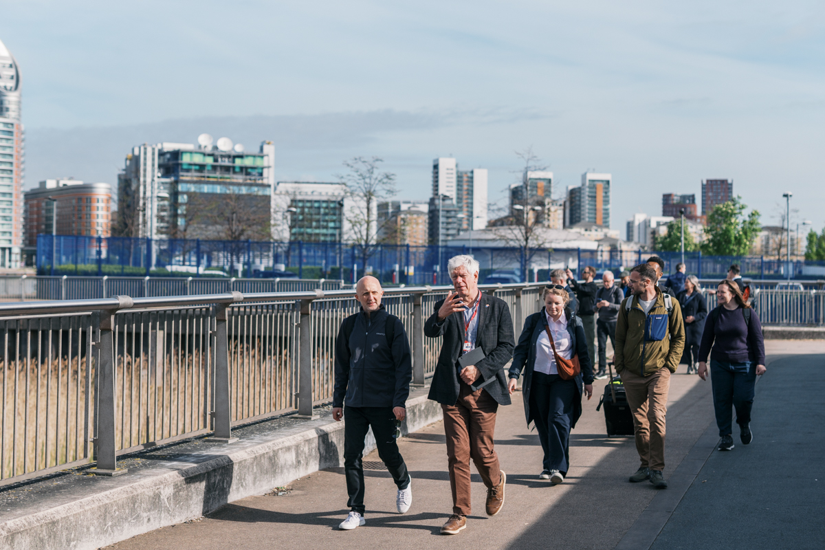 Ed Wall and Councillor Maisie Richards Cottell show guests the Thames Path