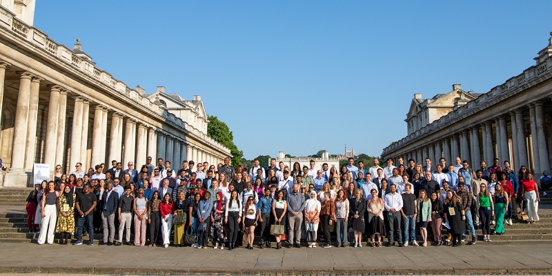 An image of the 2023 Career Mentoring Cohort stood together on the steps.