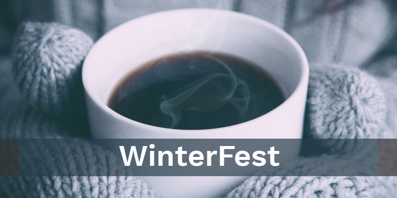WinterFest: Gloved hands cup a hot mug of coffee.