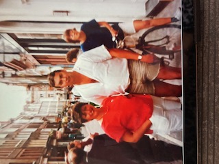Lynda & Graham pose on a busy street