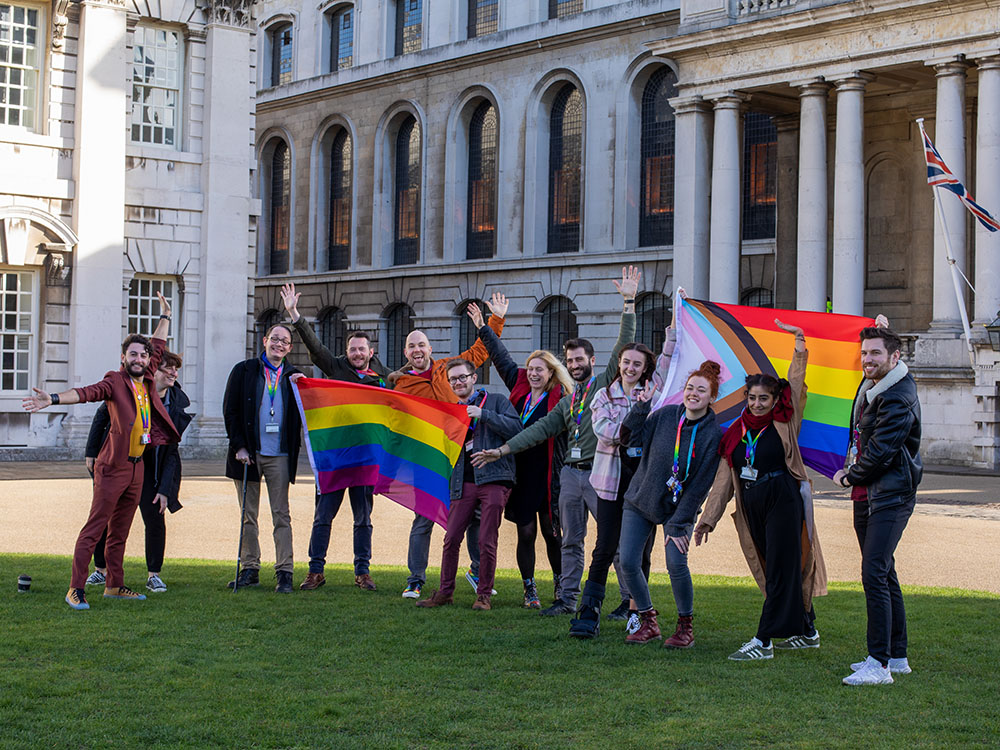 LGBT+ Staff Community celebrating LGBT+ History Month and flag raising on campus