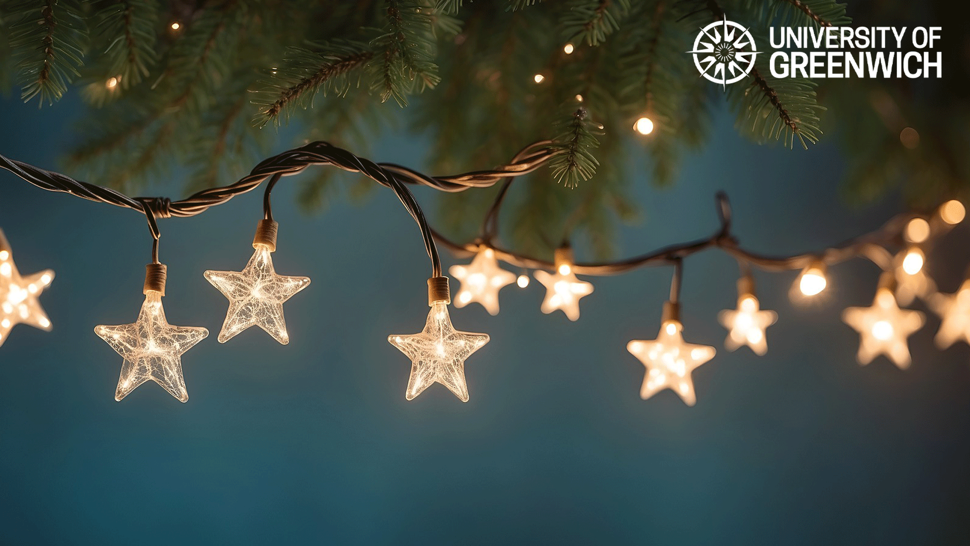 Festive background for Microsoft Teams with University logo and a closeup of star shaped fairy lights hanging below a Christmas tree branch.